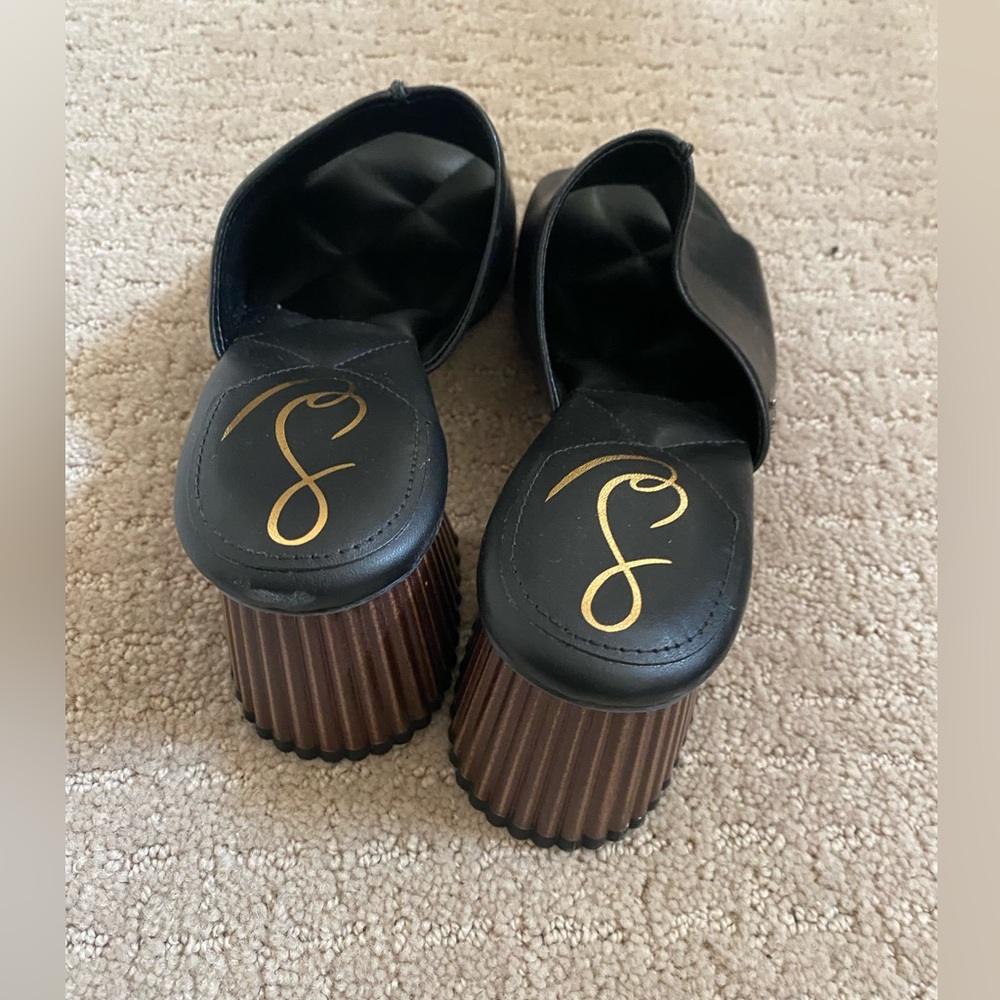 Sam Edelman black leather mules with brown wooden heel. Super comfy.